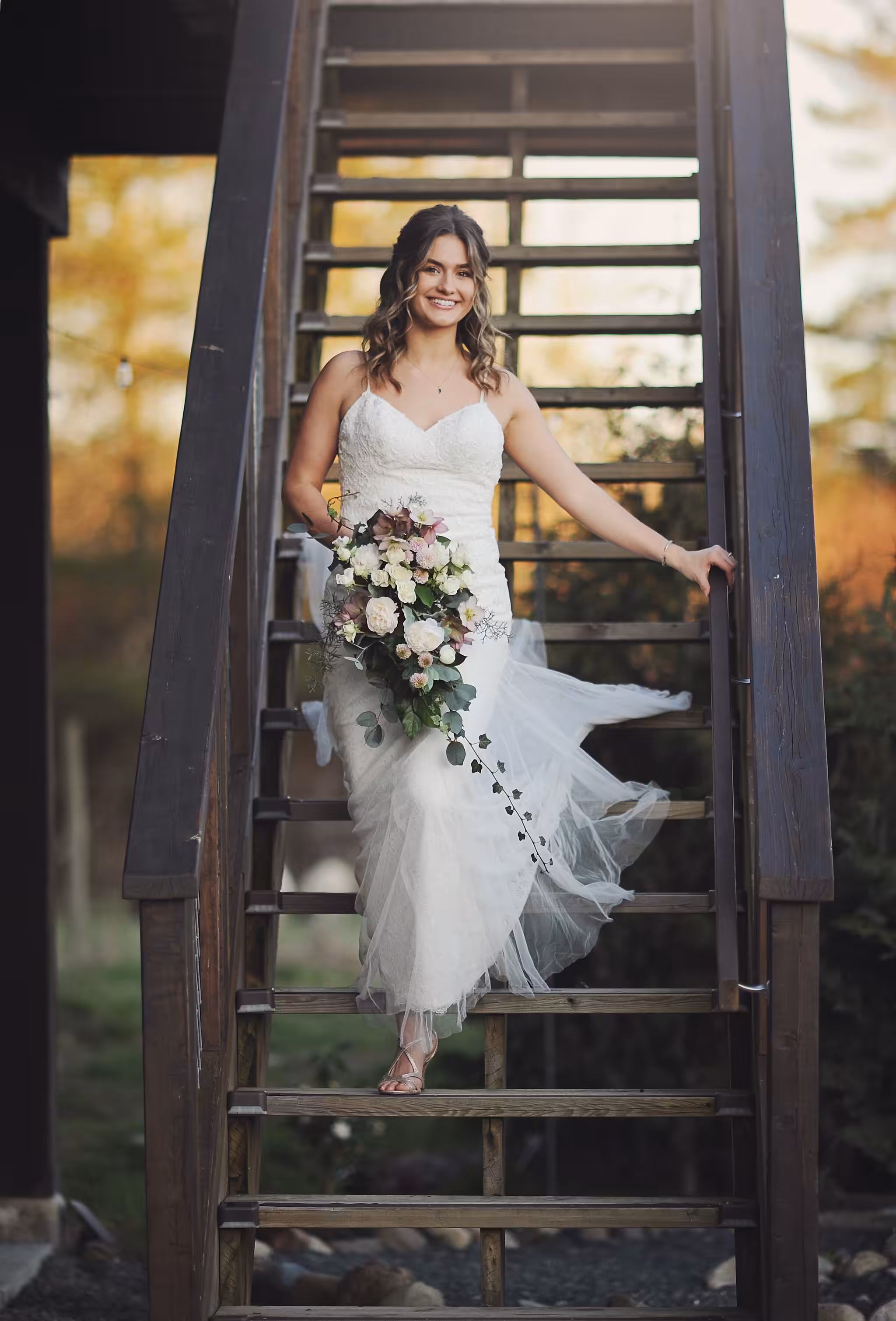 Bride on the stairs at The Truffle Farm bridal suite