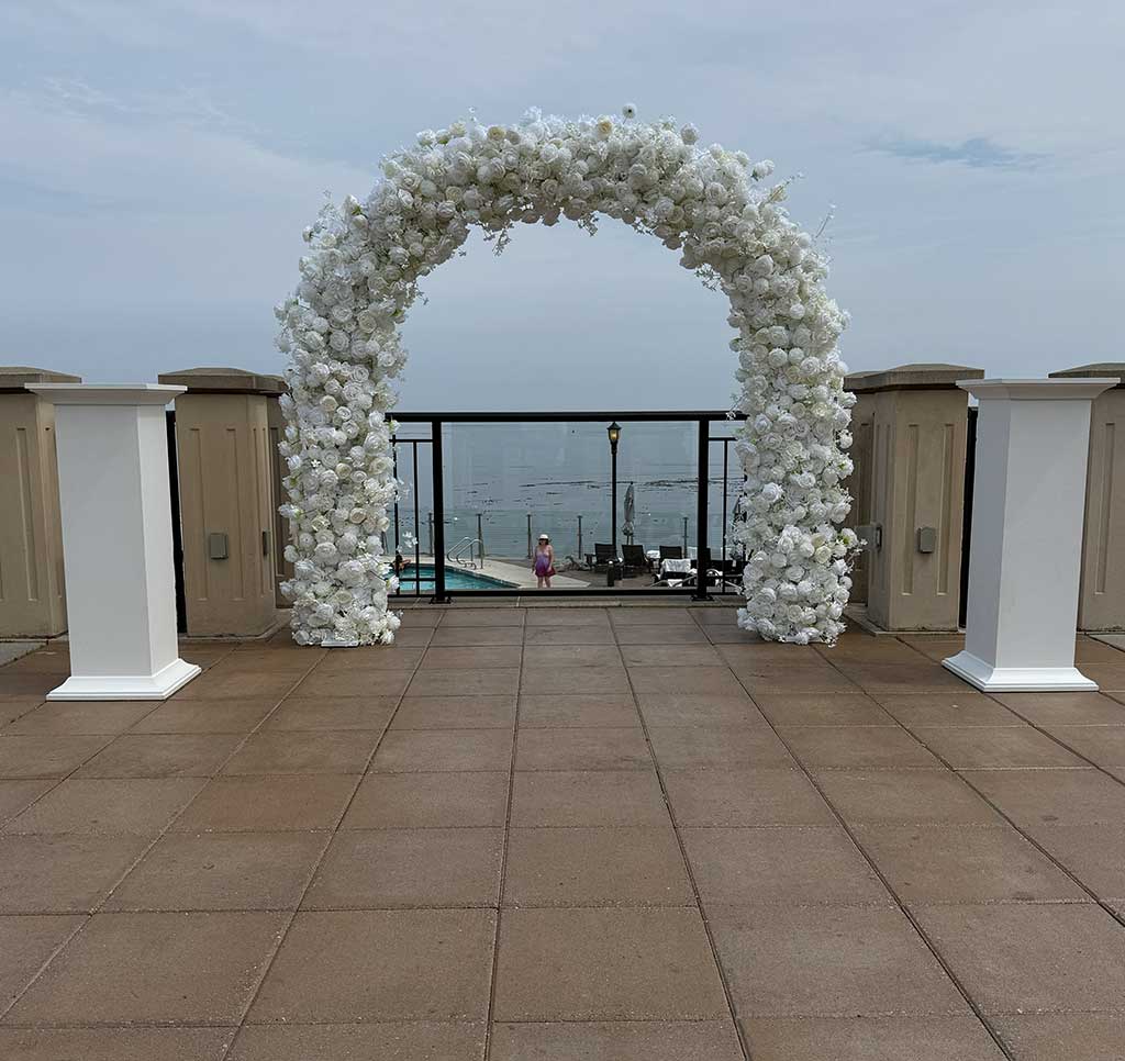 Wedding decor details with florals and curated ceremony styling.