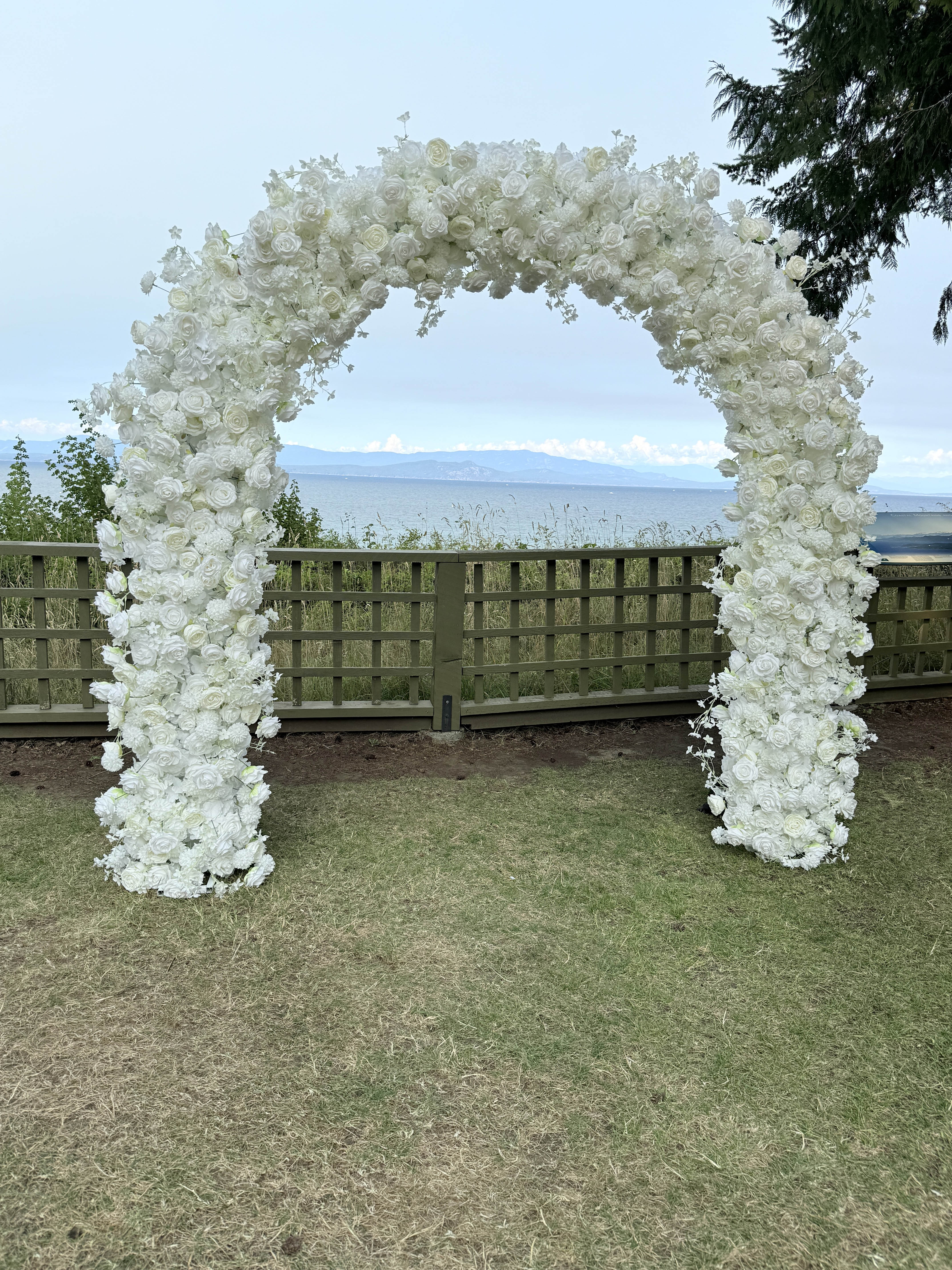 Outdoor wedding arch at an affordable Qualicum Beach venue on Vancouver Island