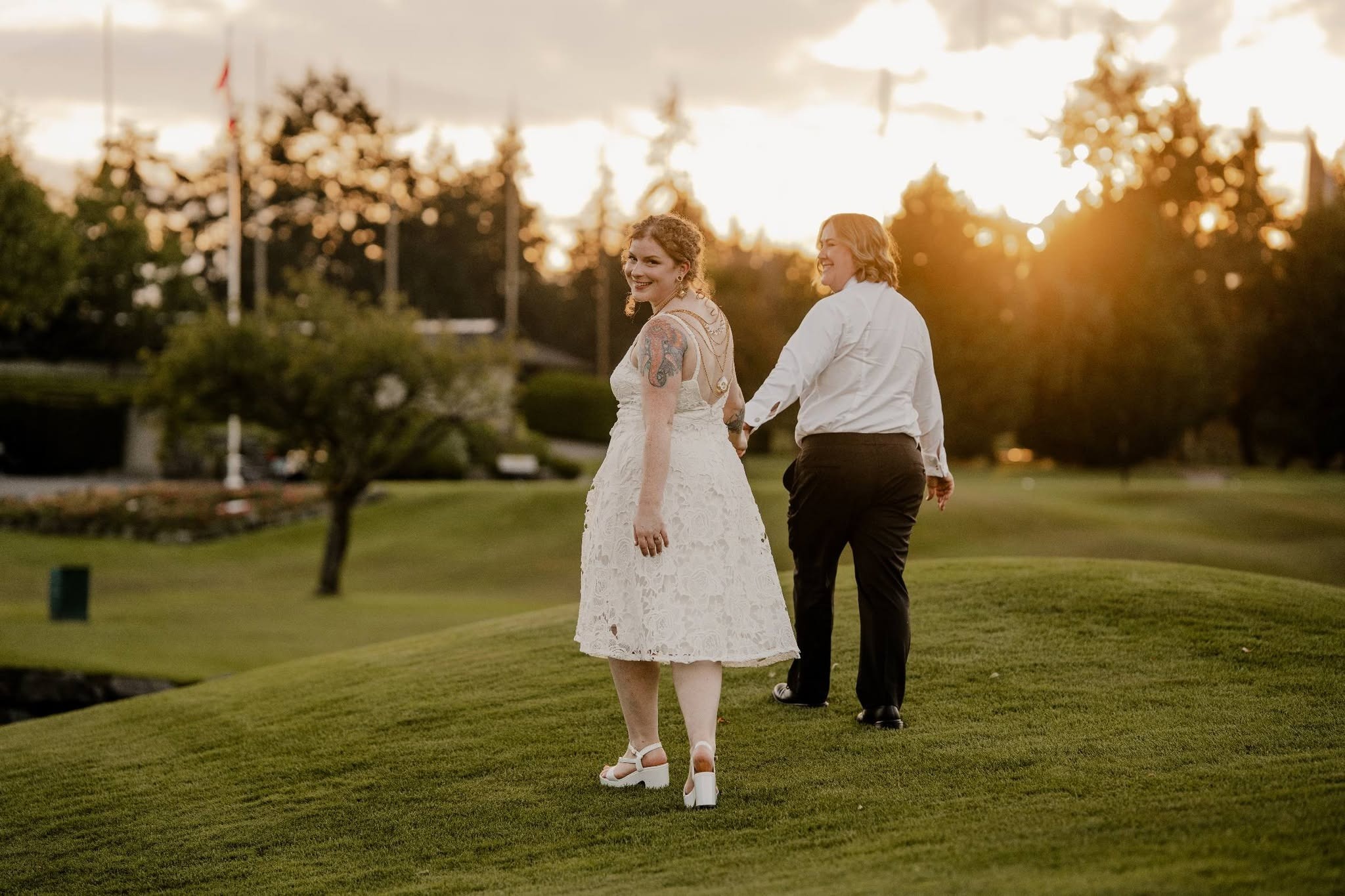 Walking across the golf course at sunset