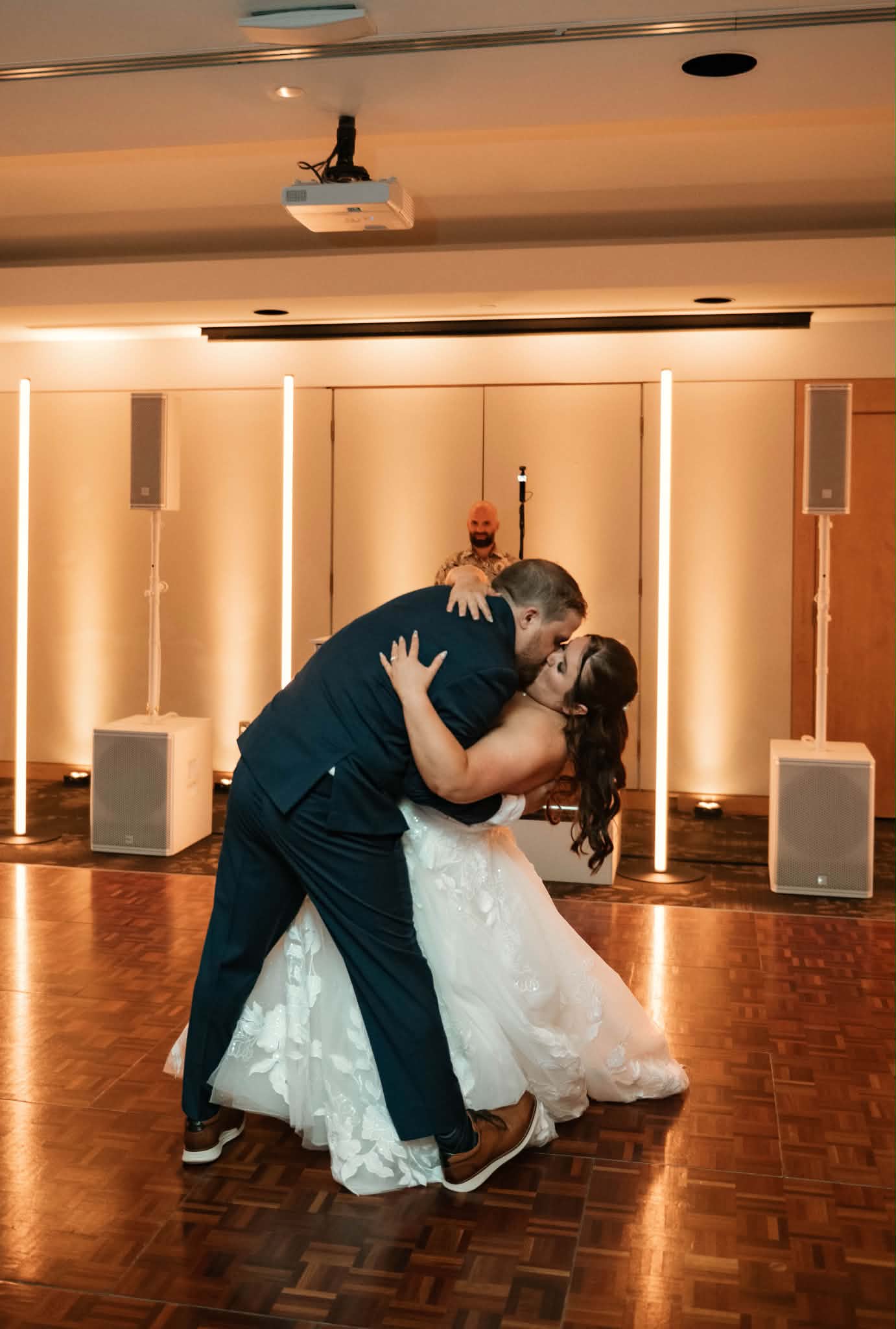 Sheldon dipping Emily during their first dance