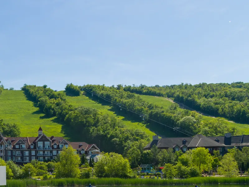 Blue Mountain village and green ski runs in summer
