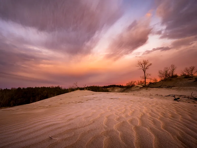 Sunrise over rippled sand dunes at Sandbanks Provincial Park